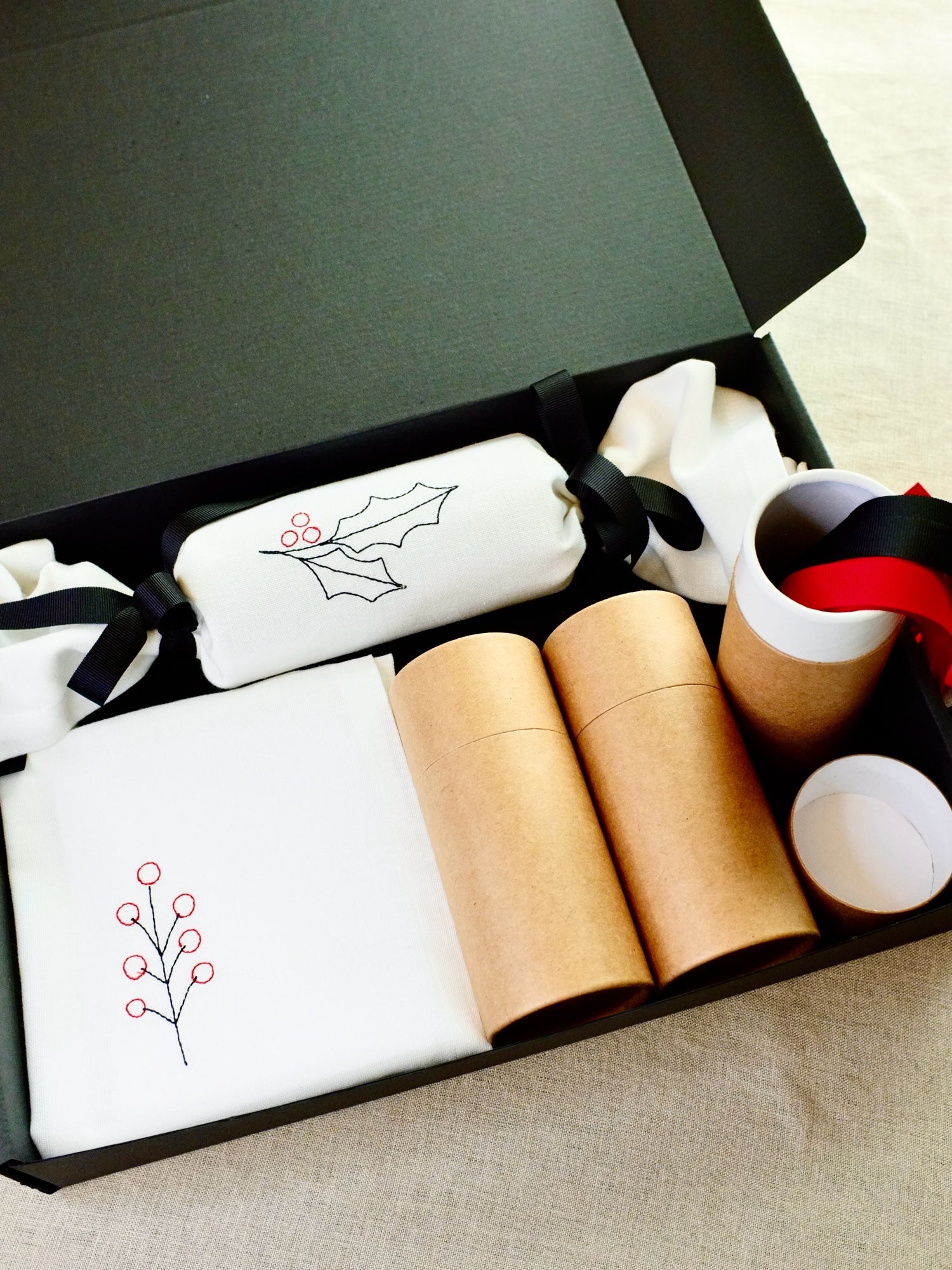 Gift box set of reusable cotton embroidered Christmas cracker napkins