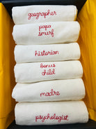 Set of six personalised nickname napkins for the whole family tablescape with phrases like madre, bonus child, papa