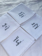 Custom embroidered conversation starter napkins in black thread
