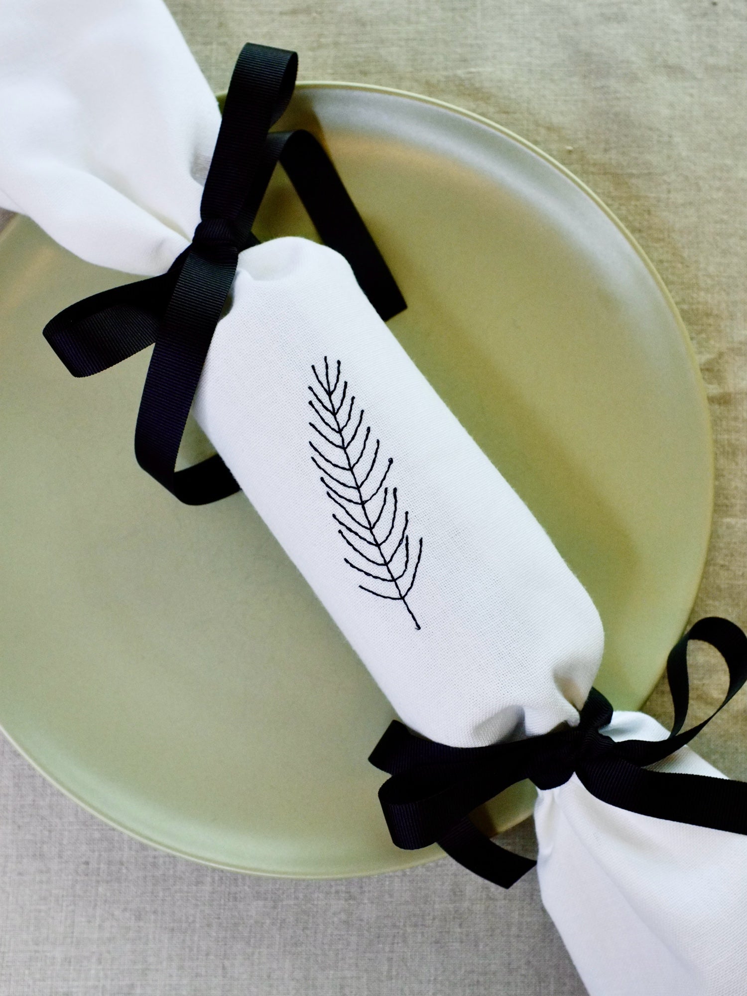 Fir design reusable Christmas embroidered napkin cracker with black bows