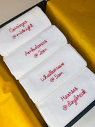 A set of bespoke embroidered napkins for a JRR Tolkien fan including hearses at daybreak