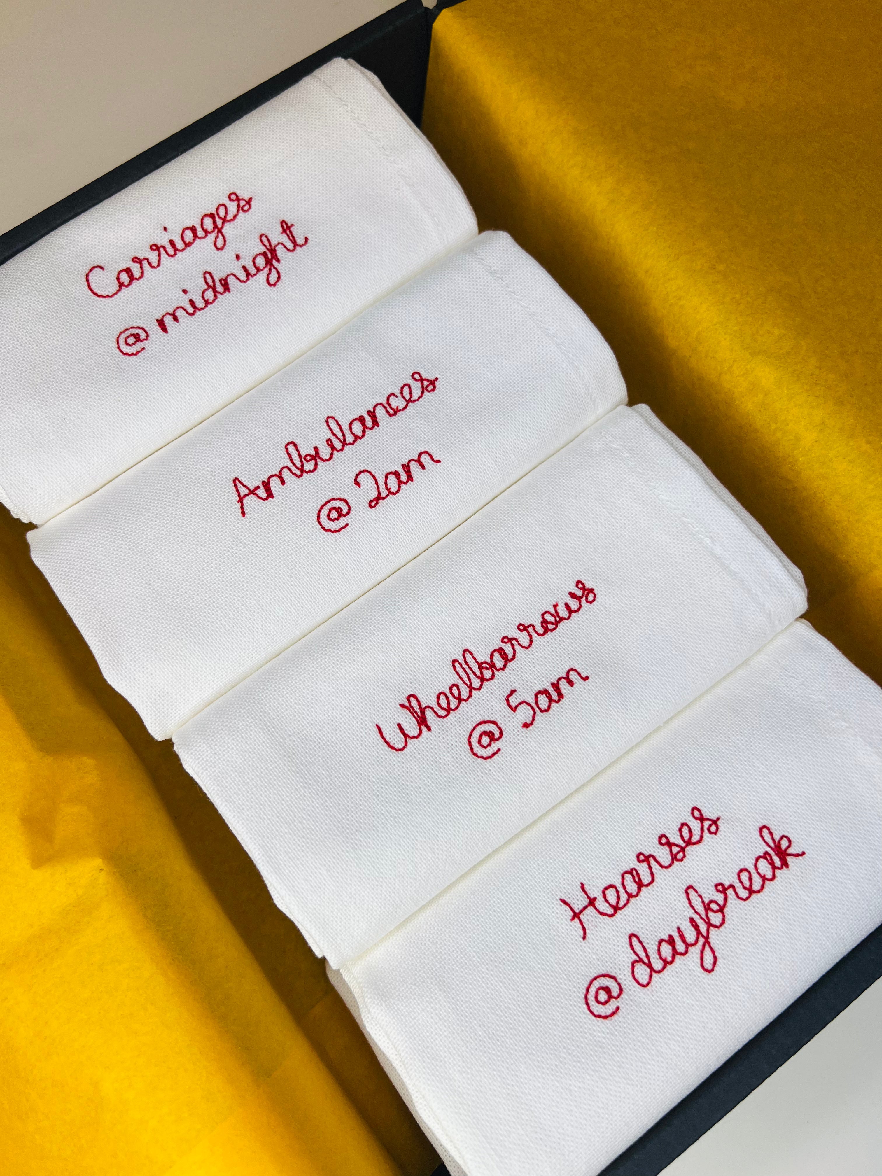 A set of bespoke embroidered napkins for a JRR Tolkien fan including hearses at daybreak