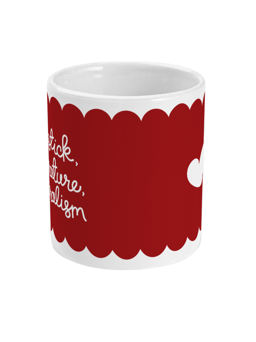 White ceramic mug with a deep red scalloped design, featuring the hand-lettered phrase ‘Lipstick, Literature, Liberalism’ in white cursive. A small white heart is on the reverse side.
