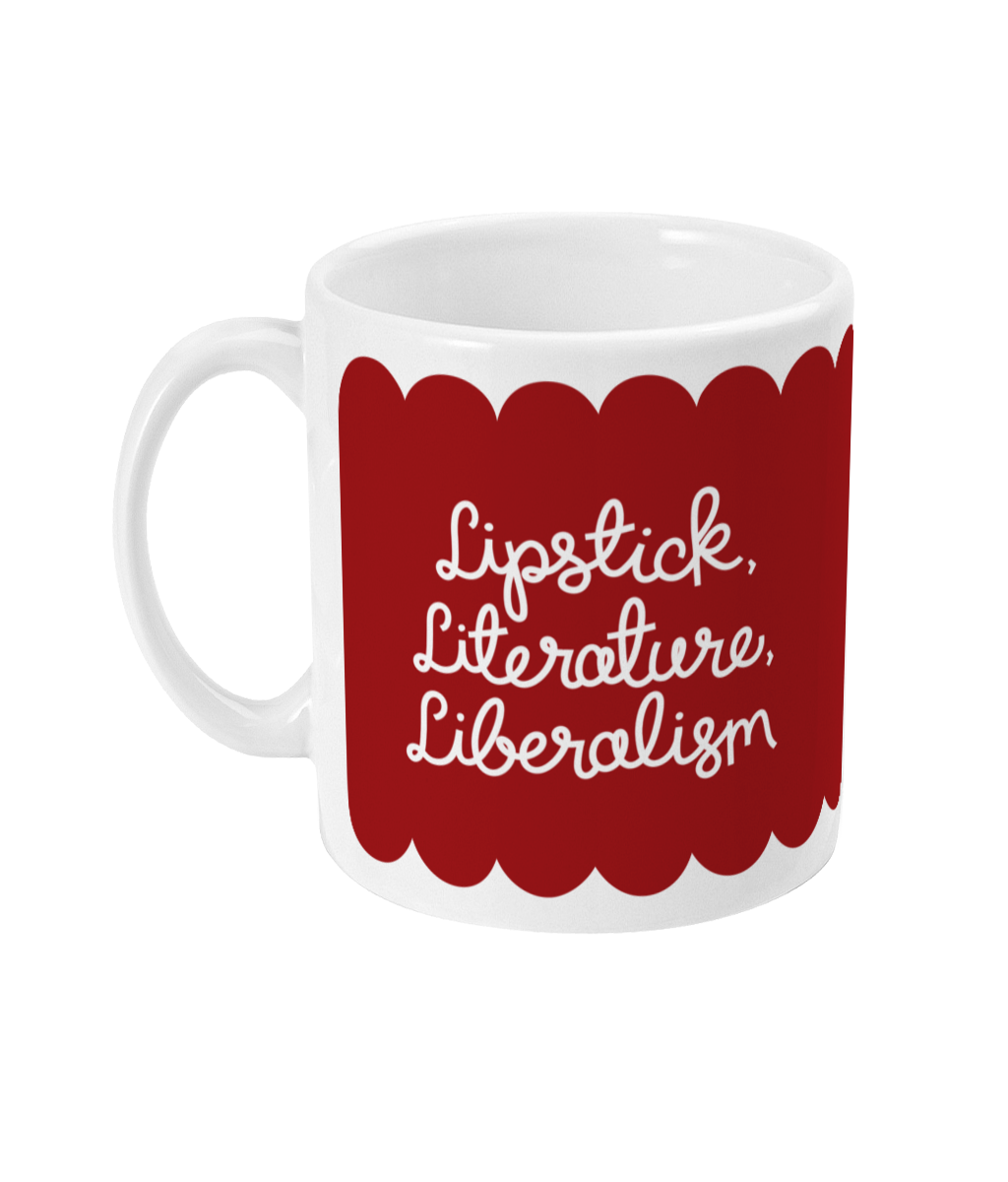 Side view of the ‘Lipstick, Literature, Liberalism’ mug, showing the curved handle and hand-lettered text in white against a bold red background.