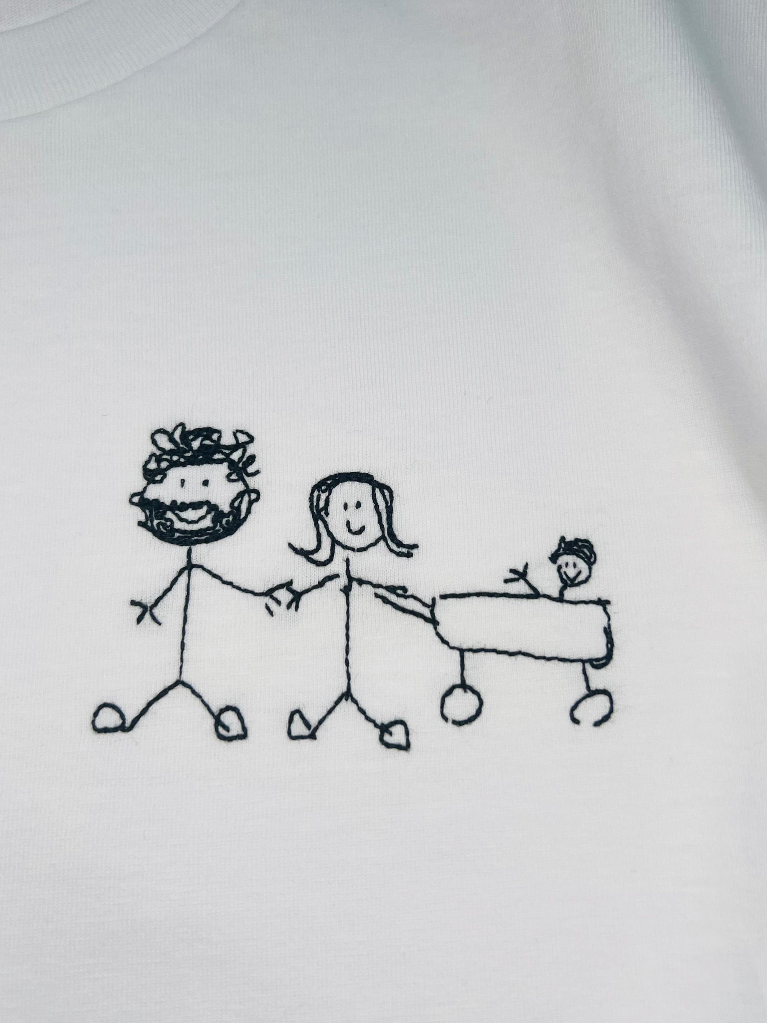 White tee with a child’s embroidered drawing perfect for Father’s Day or Mother’s Day