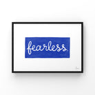 Framed artwork with the word 'fearless' on a blue background