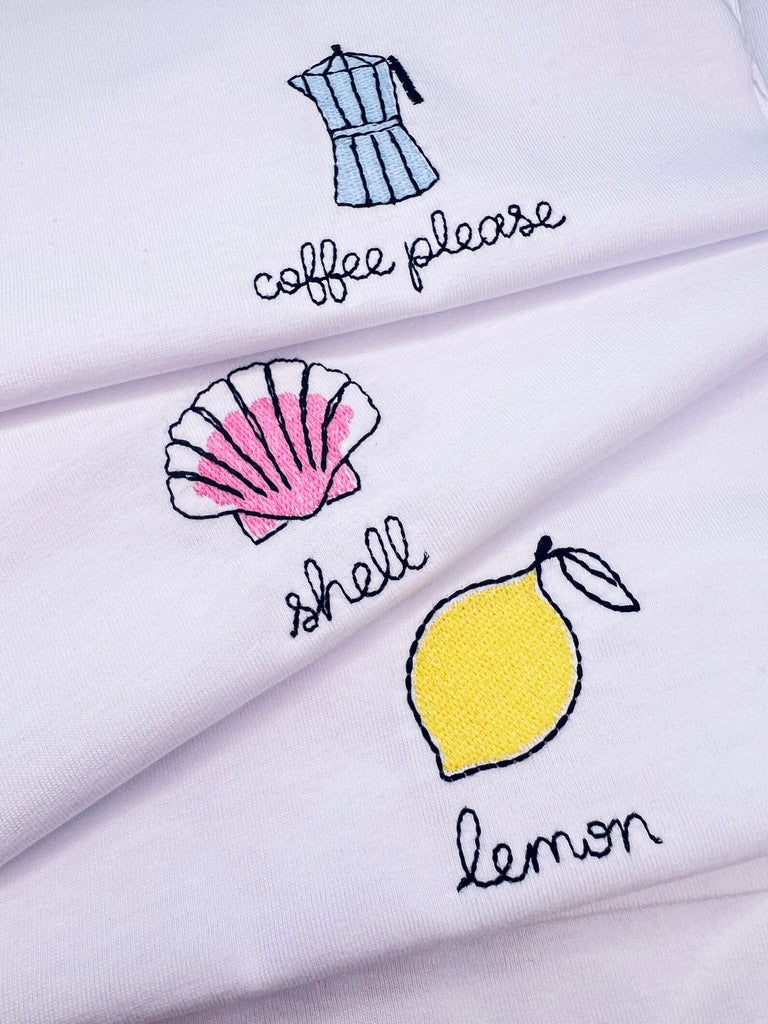 Embroidery motif on white T-shirt with custom names, perfect for personalized gifts 