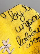 Embroidered yellow domestic duster