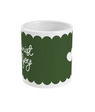 Side view of the ‘Feminist Killjoy’ mug showing hand-lettered text in white against an olive green background.